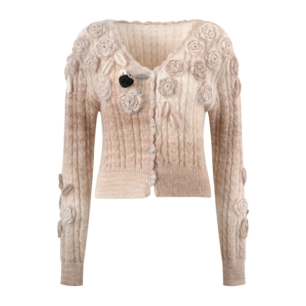 Pink knitted sweater with a three-dimensional floral design and cardigan sweater