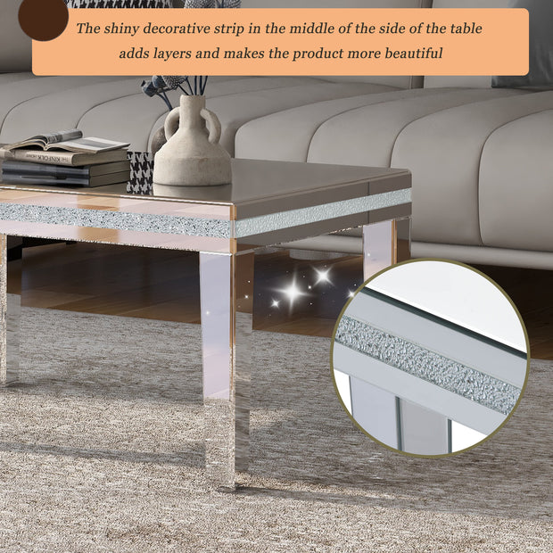 The ON-TRANS stylish modern glass mirrored coffee table features a crystal design and adjustable height legs in silver